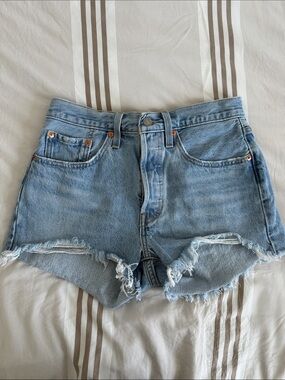 Levi's Medium Light Blue Distressed Fringe High-Rise Button Up Denim Shorts